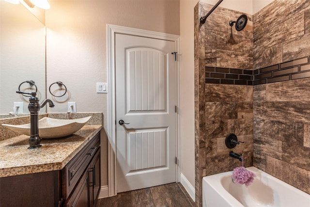 2323 Foley Rd, Crosby, TX 77532 - full bath featuring vanity,  shower combination, and wood finished floors