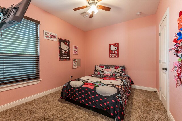 2323 Foley Rd, Crosby, TX 77532 - bedroom featuring carpet floors and ceiling fan