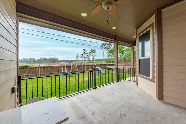 2323 Foley Rd, Crosby, TX 77532 - fenced backyard with a patio area and ceiling fan