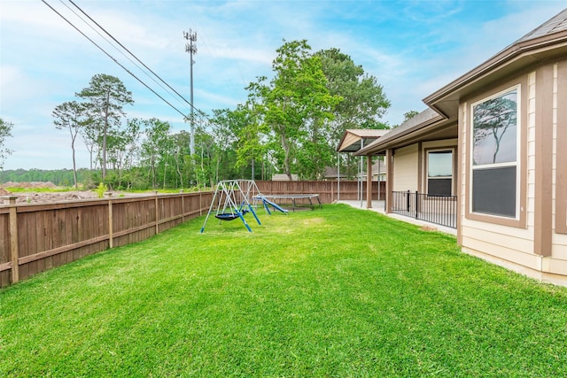 2323 Foley Rd, Crosby, TX 77532 - fenced backyard featuring a playground and a trampoline
