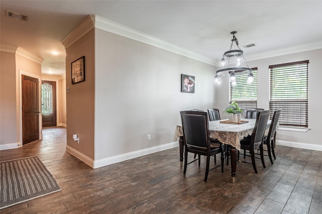 2323 Foley Rd, Crosby, TX 77532 - dining area with healthy amount of natural light, ornamental molding, and dark wood-style floors