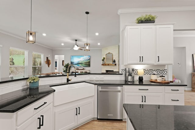 1603 Country Club Dr, Crosby, TX 77532 - kitchen featuring a sink, stainless steel dishwasher, tasteful backsplash, crown molding, and ceiling fan