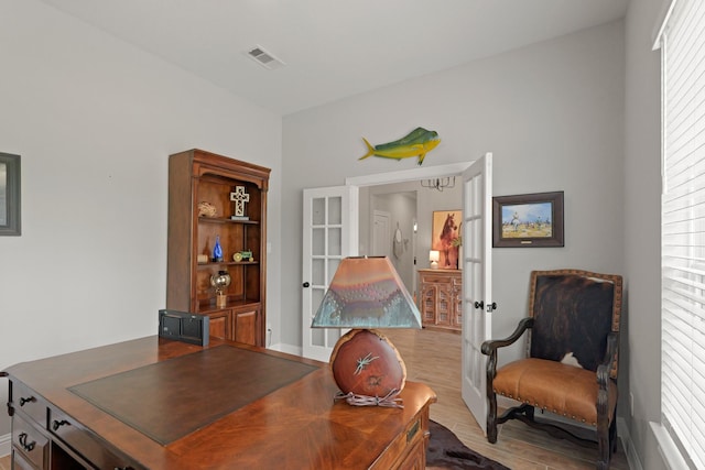1603 Country Club Dr, Crosby, TX 77532 - home office featuring wood finished floors, french doors, and baseboards