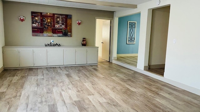 1602 W Blum St, Alvin, TX 77511 - spare room featuring light wood finished floors and baseboards