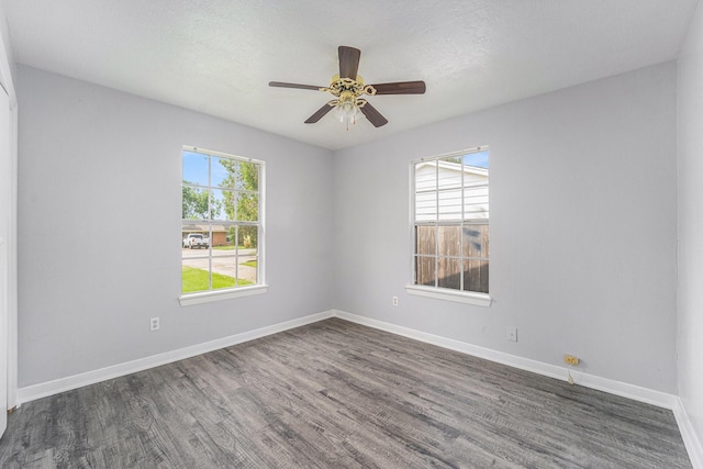 3517 Sparrow St, Houston, TX 77051 - unfurnished room featuring dark wood finished floors, baseboards, and ceiling fan