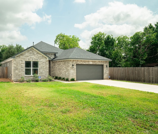 3405 Rebecca St, Houston, TX 77021 - view of front facade featuring brick siding, a garage, concrete driveway, and roof with shingles