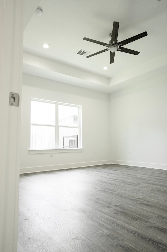 3405 Rebecca St, Houston, TX 77021 - empty room with recessed lighting, baseboards, ceiling fan, a raised ceiling, and a smoke detector
