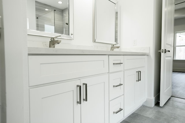 3405 Rebecca St, Houston, TX 77021 - full bathroom with double vanity, a shower with shower door, and recessed lighting