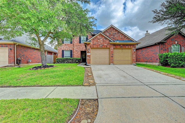 5838 Deleon Trail Dr, Spring, TX 77379 - view of front facade featuring an attached garage, brick siding, a front yard, and concrete driveway