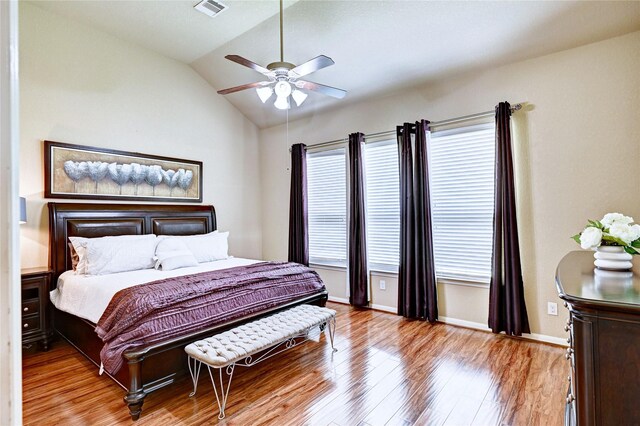 5838 Deleon Trail Dr, Spring, TX 77379 - bedroom with light wood finished floors, vaulted ceiling, baseboards, and a ceiling fan