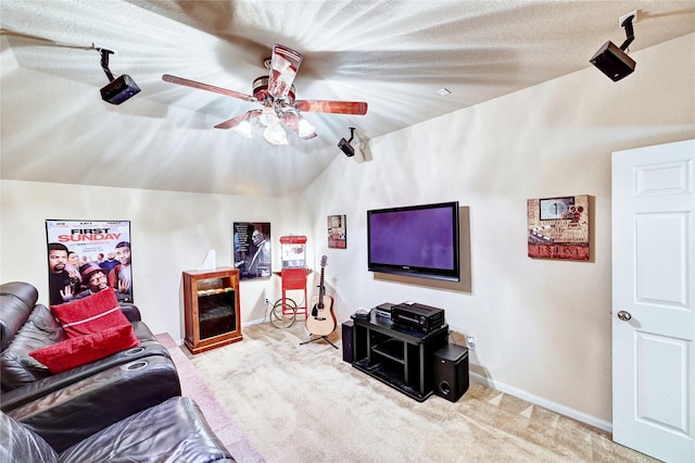 5838 Deleon Trail Dr, Spring, TX 77379 - carpeted living area featuring vaulted ceiling, a ceiling fan, and baseboards