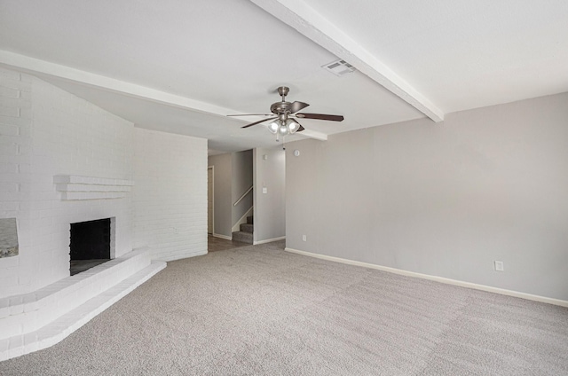 6814 Indian Falls Dr, Houston, TX 77489 - unfurnished living room with beamed ceiling, ceiling fan, stairs, carpet, and baseboards