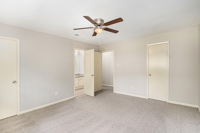 6814 Indian Falls Dr, Houston, TX 77489 - unfurnished bedroom featuring light colored carpet, baseboards, and ensuite bathroom