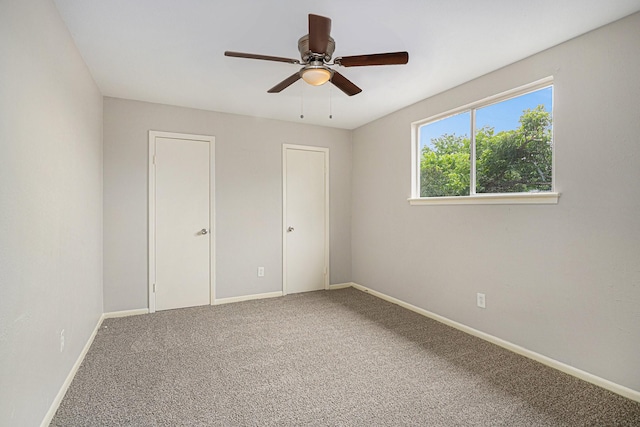 6814 Indian Falls Dr, Houston, TX 77489 - unfurnished bedroom with carpet, baseboards, and a ceiling fan