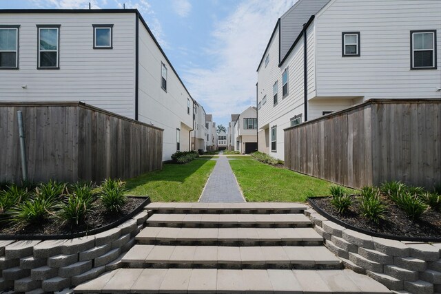 5502C Wheatley St, Houston, TX 77091 - view of property's community featuring a lawn and a residential view