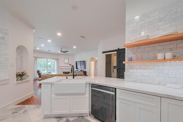 22 Tallow Hill Pl, Spring, TX 77382 - kitchen featuring dishwasher, a sink, ornamental molding, open floor plan, and open shelves