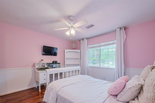 22 Tallow Hill Pl, Spring, TX 77382 - bedroom with dark wood finished floors, baseboards, and ceiling fan