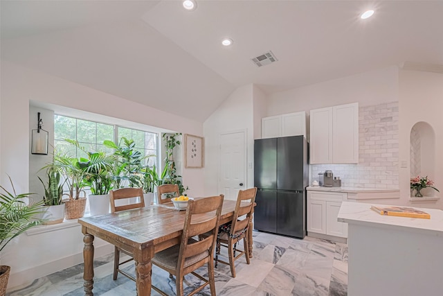 22 Tallow Hill Pl, Spring, TX 77382 - dining area featuring vaulted ceiling, light marble finish flooring, and recessed lighting