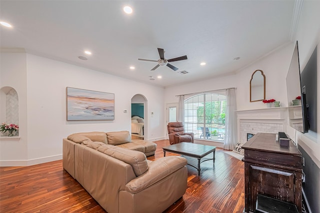 22 Tallow Hill Pl, Spring, TX 77382 - living area featuring arched walkways, wood-type flooring, ceiling fan, ornamental molding, and recessed lighting