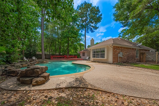 22 Tallow Hill Pl, Spring, TX 77382 - view of pool with a patio, a fenced backyard, and a gate