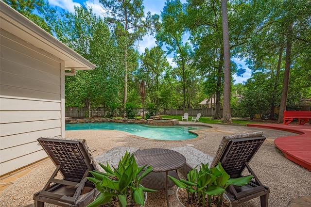 22 Tallow Hill Pl, Spring, TX 77382 - view of swimming pool with a fenced backyard, a patio, and a pool with connected hot tub