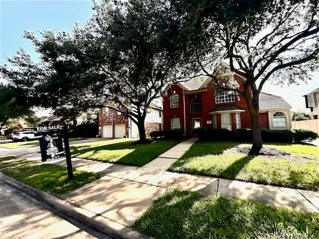 9619 Therrell Dr, Houston, TX 77064 - view of front of house featuring a front yard and driveway