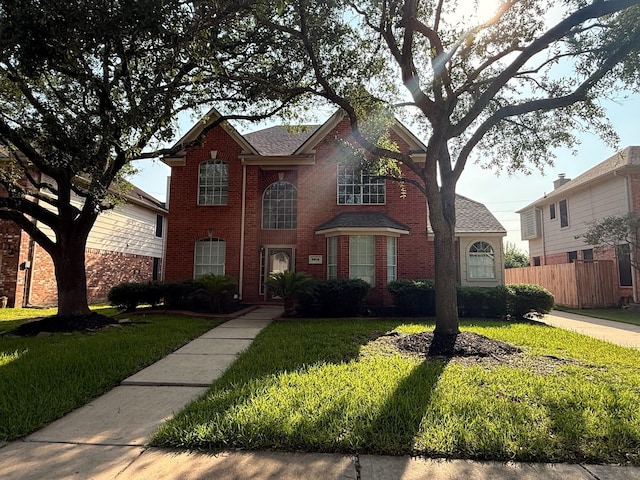 9619 Therrell Dr, Houston, TX 77064 - traditional-style home featuring brick siding and a shingled roof