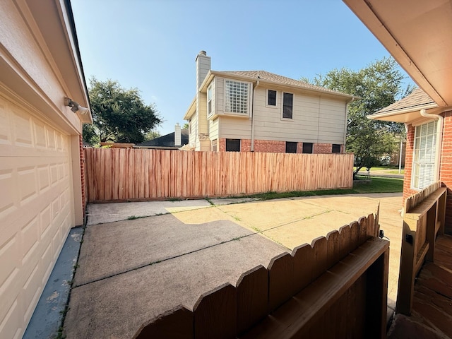 9619 Therrell Dr, Houston, TX 77064 - view of patio / terrace featuring a garage