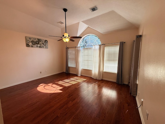 9619 Therrell Dr, Houston, TX 77064 - empty room with wood finished floors, baseboards, a ceiling fan, and lofted ceiling