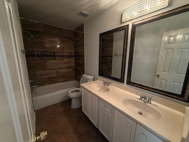 9619 Therrell Dr, Houston, TX 77064 - bathroom featuring toilet, double vanity, tile patterned flooring, and shower / tub combination