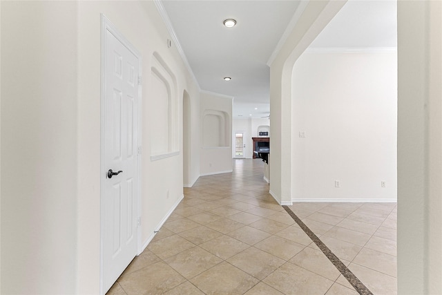 4907 Sundance Hollow Ln, Katy, TX 77494 - corridor with ornamental molding, recessed lighting, and light tile patterned floors