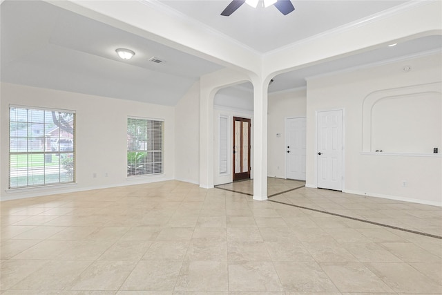 4907 Sundance Hollow Ln, Katy, TX 77494 - empty room with a ceiling fan, light tile patterned flooring, ornamental molding, and arched walkways
