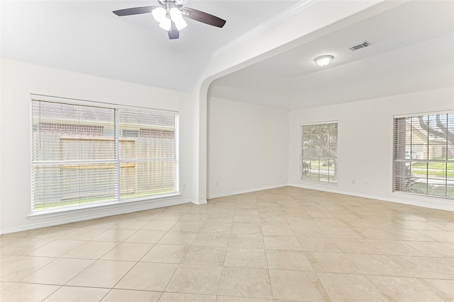 4907 Sundance Hollow Ln, Katy, TX 77494 - spare room with healthy amount of natural light, a ceiling fan, light tile patterned flooring, and crown molding