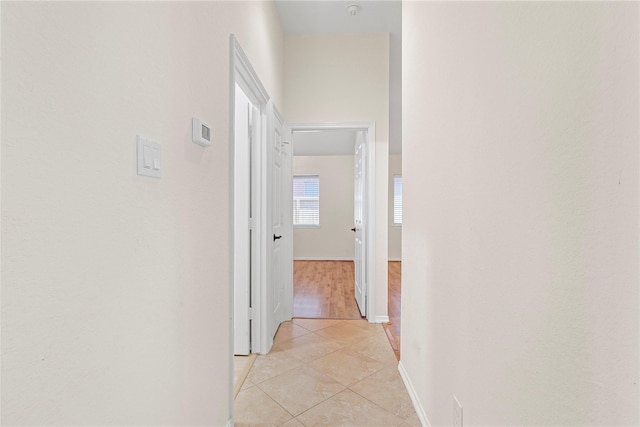 4907 Sundance Hollow Ln, Katy, TX 77494 - hallway with light tile patterned flooring and baseboards