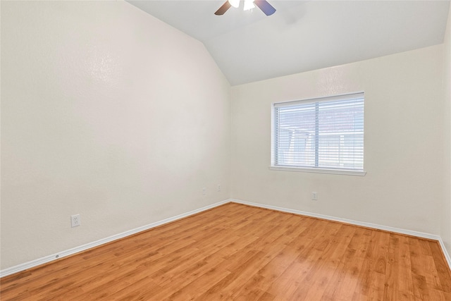 4907 Sundance Hollow Ln, Katy, TX 77494 - empty room featuring ceiling fan, light wood-type flooring, and vaulted ceiling