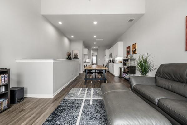 4908 Paradigm Ln, Spring, TX 77379 - living room with dark wood finished floors, recessed lighting, and baseboards