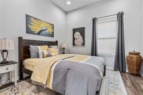 4908 Paradigm Ln, Spring, TX 77379 - bedroom featuring wood finished floors, recessed lighting, and baseboards