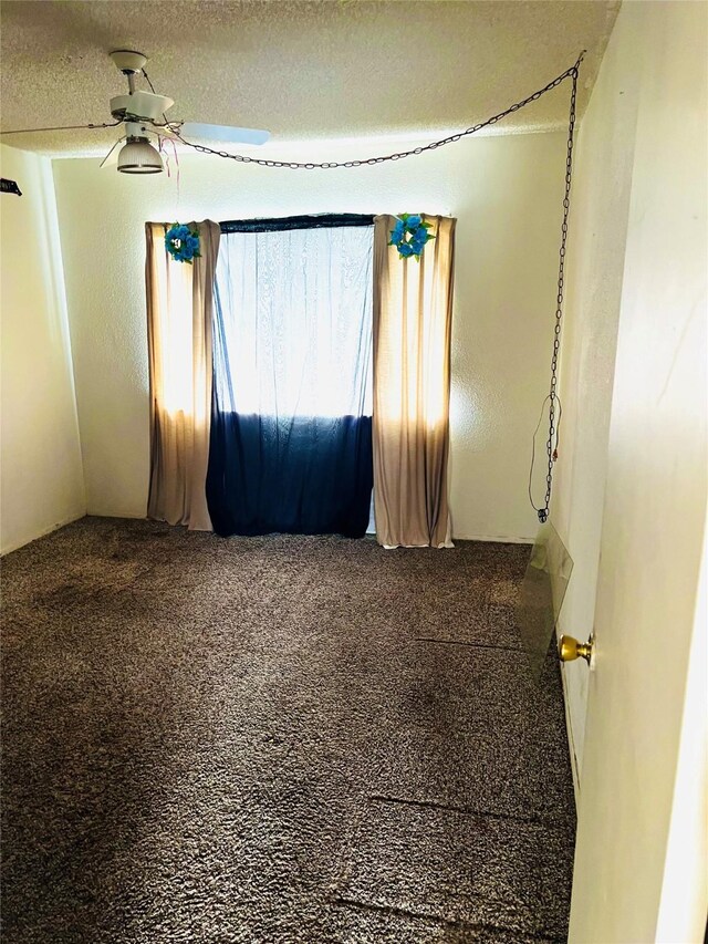 6128 Dryad Dr, Houston, TX 77035 - empty room featuring ceiling fan, carpet floors, and a textured ceiling