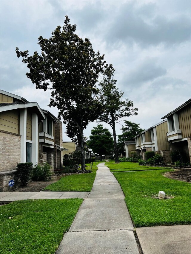 6128 Dryad Dr, Houston, TX 77035 - surrounding community with a yard