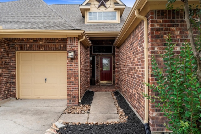 19918 Cypresswood Lake Dr, Spring, TX 77373 - property entrance featuring roof with shingles, a garage, brick siding, and concrete driveway