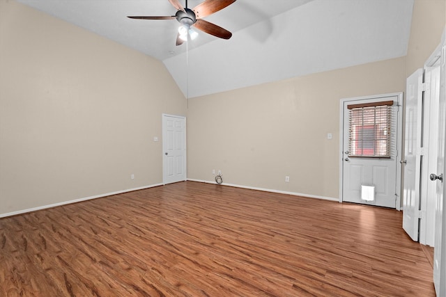 19918 Cypresswood Lake Dr, Spring, TX 77373 - unfurnished room with wood finished floors, ceiling fan, baseboards, and high vaulted ceiling