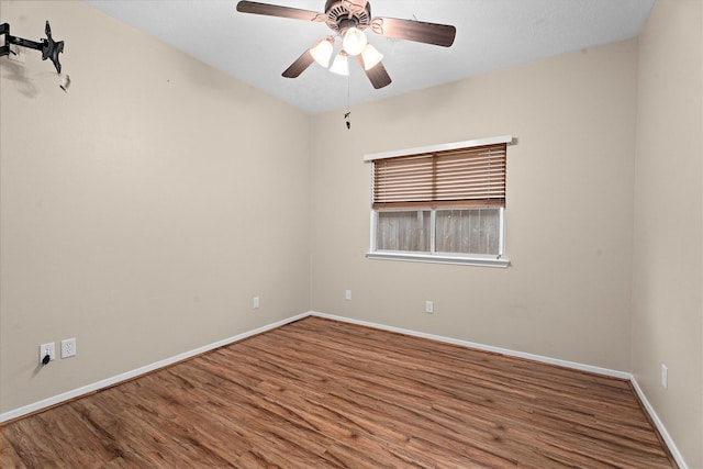 19918 Cypresswood Lake Dr, Spring, TX 77373 - spare room with wood finished floors, baseboards, and a ceiling fan