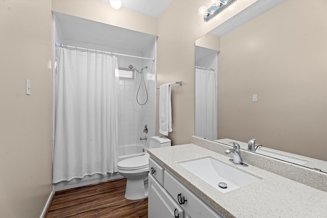 19918 Cypresswood Lake Dr, Spring, TX 77373 - bathroom featuring vanity, toilet, shower / bath combo with shower curtain, and wood finished floors