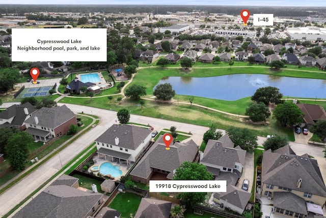 19918 Cypresswood Lake Dr, Spring, TX 77373 - aerial overview of property's location with a pool, nearby suburban area, and a large body of water