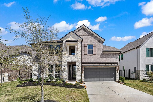 3002 Secret Lagoon Ln, Texas City, TX 77568 - french country style house featuring concrete driveway, a garage, a standing seam roof, and stone siding