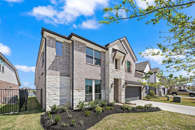 3002 Secret Lagoon Ln, Texas City, TX 77568 - view of front facade with stone siding, concrete driveway, a garage, and brick siding