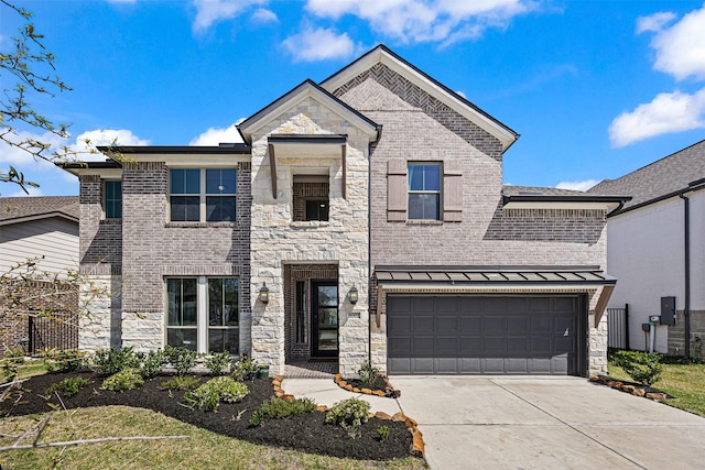 3002 Secret Lagoon Ln, Texas City, TX 77568 - view of front facade with stone siding, concrete driveway, a garage, and brick siding