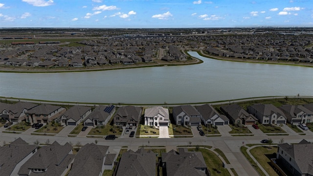 3002 Secret Lagoon Ln, Texas City, TX 77568 - aerial perspective of suburban area featuring a large body of water
