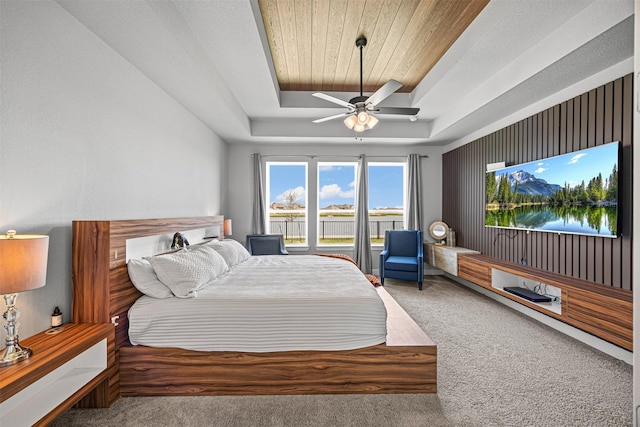 3002 Secret Lagoon Ln, Texas City, TX 77568 - carpeted bedroom with a raised ceiling, a ceiling fan, and wooden ceiling