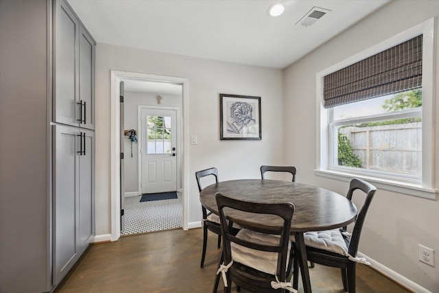 5211 Briarbend Dr, Houston, TX 77035 - dining space with baseboards, dark wood-style floors, and recessed lighting
